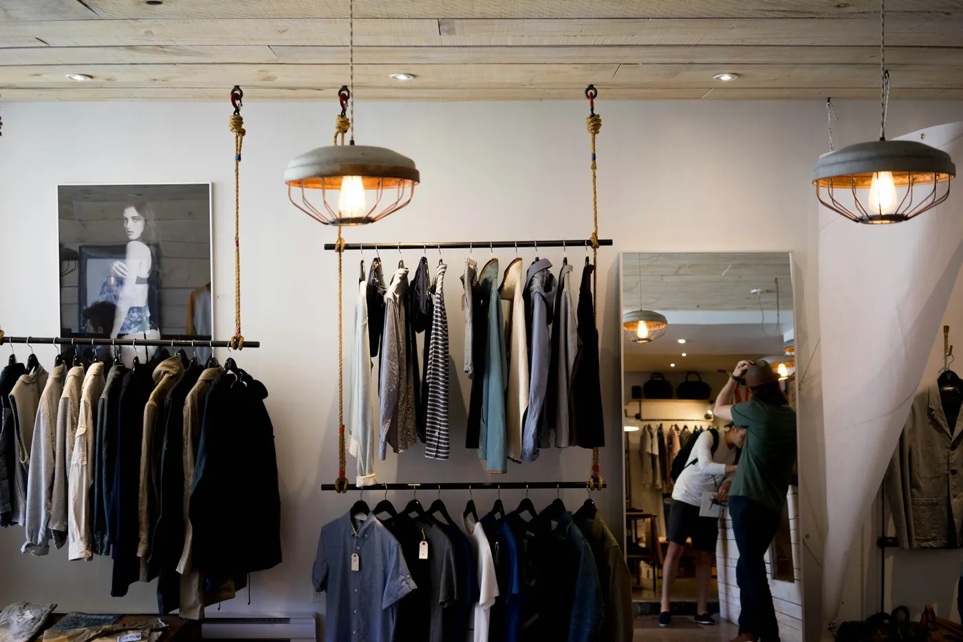 A clothing boutique interior with hanging rails