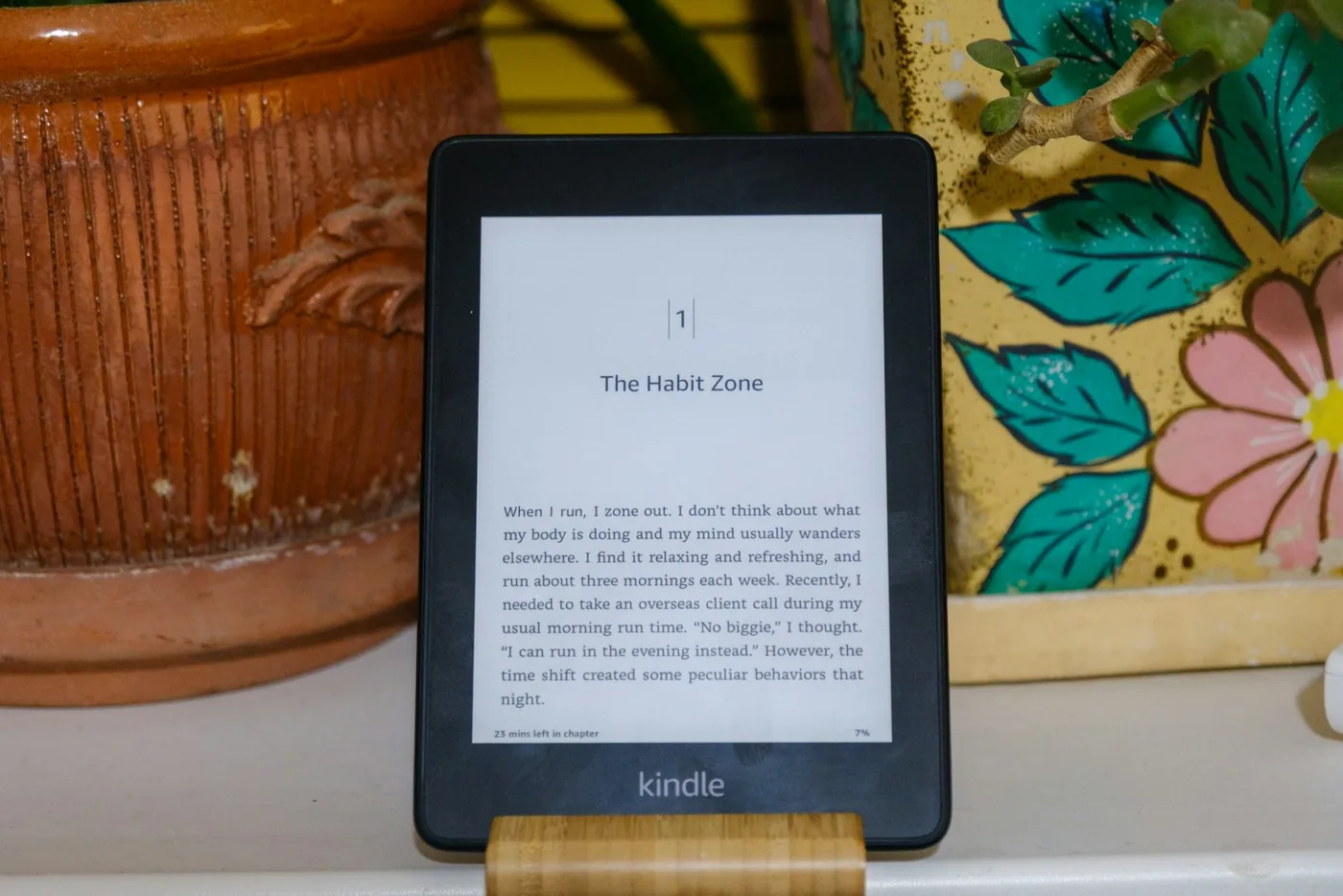 An e-reader on a stand displaying text